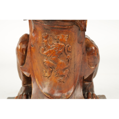 359 - A GOOD LATE 19TH CENTURY CARVED WALNUT HERALDIC LION resting on a shield with coat of arms and squar... 