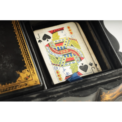 360 - A GOOD 19TH CENTURY PAPIER MACHE GAMES BOX having shaped moulded edge and recessed centre, decorated... 