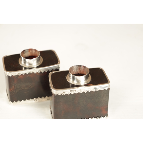 362 - A PAIR OF EARLY 20TH CENTURY TORTOISESHELL AND SILVER MOUNTED TEA-CADDIES having circular push on to... 