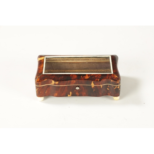 367 - A 19TH CENTURY TORTOISESHELL AND IVORY SERPENTINE GLAZED TOP DRESSING TABLE BOX with glazed hinged l... 