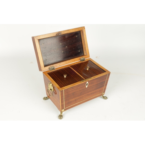 378 - A GOOD REGENCY BRASS INLAID ROSEWOOD TEA CADDY with hinged moulded top and tapering body, fitted lio... 