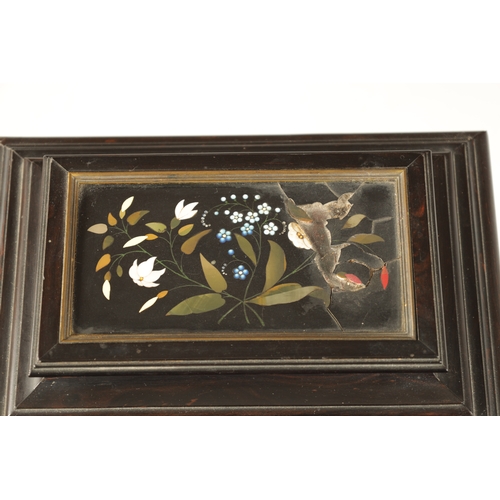 385 - A 19TH CENTURY FRENCH EBONY AND PIETRA DURA PANELLED JEWELLERY CASKET the moulded box inset with Ita... 