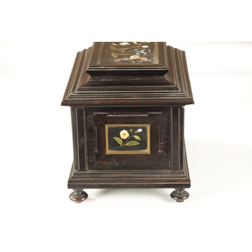 385 - A 19TH CENTURY FRENCH EBONY AND PIETRA DURA PANELLED JEWELLERY CASKET the moulded box inset with Ita... 