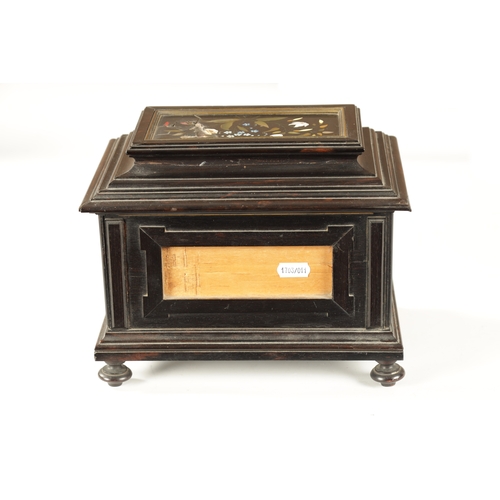 385 - A 19TH CENTURY FRENCH EBONY AND PIETRA DURA PANELLED JEWELLERY CASKET the moulded box inset with Ita... 