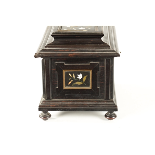 385 - A 19TH CENTURY FRENCH EBONY AND PIETRA DURA PANELLED JEWELLERY CASKET the moulded box inset with Ita... 