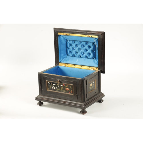 385 - A 19TH CENTURY FRENCH EBONY AND PIETRA DURA PANELLED JEWELLERY CASKET the moulded box inset with Ita... 