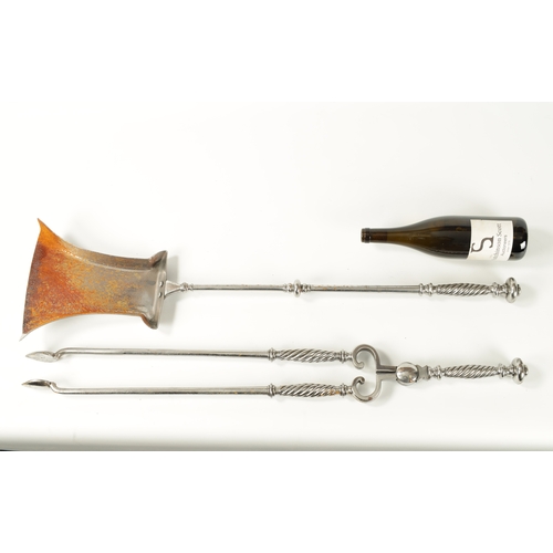 388 - A SET OF TWO COUNTRY HOUSE GEORGIAN STEEL FIRE IRONS comprising of a shaped shovel and tongs, having... 