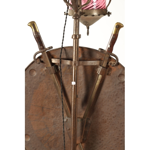 391 - A STYLISH ART AND CRAFTS PLANISHED COPPER AND STEEL ADJUSTABLE STANDARD LAMP with hanging ruby glass... 