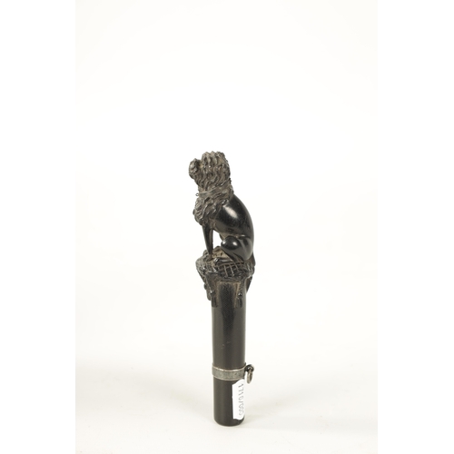 395 - A 19TH CENTURY FRENCH FINELY CARVED EBONY AND SILVER MOUNTED WALKING CAN HANDLE with tapered shank a... 