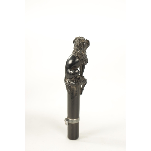 395 - A 19TH CENTURY FRENCH FINELY CARVED EBONY AND SILVER MOUNTED WALKING CAN HANDLE with tapered shank a... 