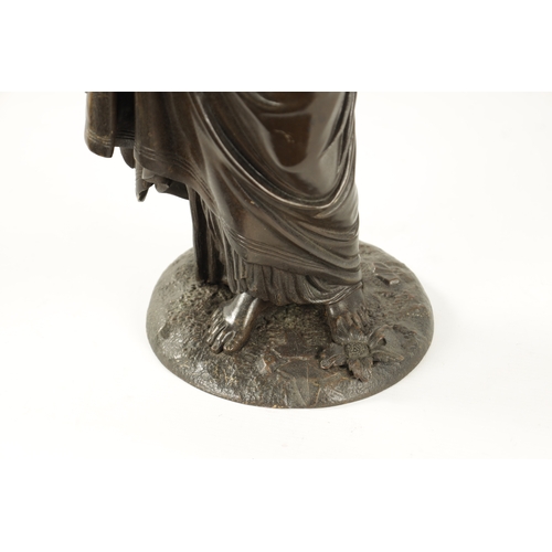 404 - A 19TH CENTURY BRONZE FIGURAL SCULPTURE depicting a classical standing lady (56cm high )