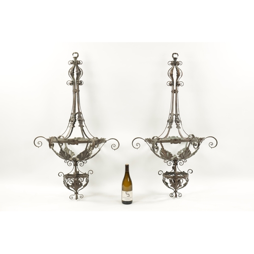 405 - AN IMPRESSIVE LARGE PAIR OF ARTS AND CRAFTS PLANISHED BRASS HANGING LIGHTS with scrolled frames and ... 