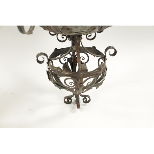 405 - AN IMPRESSIVE LARGE PAIR OF ARTS AND CRAFTS PLANISHED BRASS HANGING LIGHTS with scrolled frames and ... 