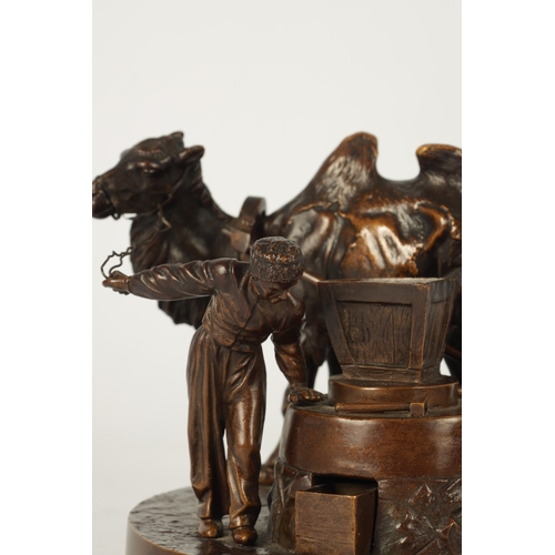 407 - A.M. BONEGOR. A LATE 19TH CENTURY RUSSIAN PATINATED BRONZE SCULPTURE modelled as a Cossack leading a... 