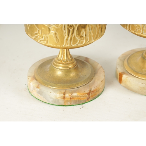 408 - A PAIR OF LATE 19TH CENTURY FRENCH GILT BRONZE CLASSICAL EWERS ON ALABASTER BASES with slender flare... 