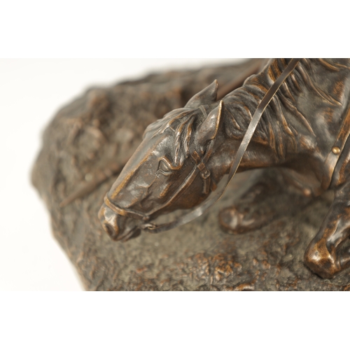 411 - A 19TH CENTURY RUSSIAN BRONZE SCULPTURE depicting a solider firing a gun laid on his horse - inscrib... 