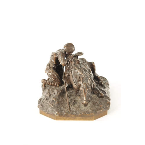 411 - A 19TH CENTURY RUSSIAN BRONZE SCULPTURE depicting a solider firing a gun laid on his horse - inscrib... 