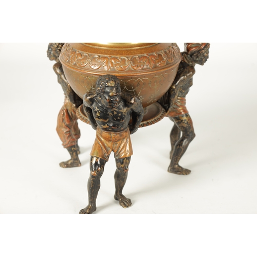 412 - A 19TH CENTURY COLD PAINTED BRONZE TABLE CENTRE PIECE with embossed lidded urn supported by three fi... 