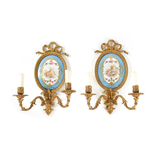 413 - A PAIR OF 19TH CENTURY STYLE FRENCH SERVES PANELLED AND ORMOLU MOUNTED TWO BRANCH WALL LIGHTS having... 