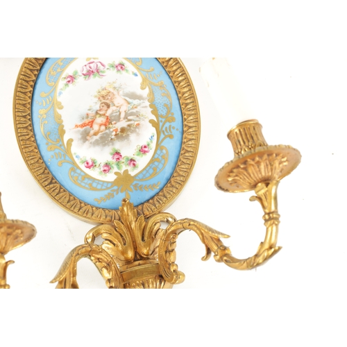 413 - A PAIR OF 19TH CENTURY STYLE FRENCH SERVES PANELLED AND ORMOLU MOUNTED TWO BRANCH WALL LIGHTS having... 