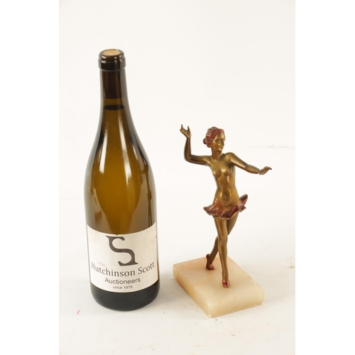 414 - A LORENZL STYLE ART DECO COLD PAINTED SPELTER FIGURE Modelled as a semi-nude dancer on rectangular o... 