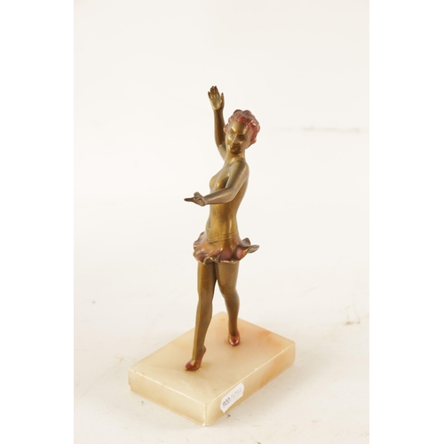 414 - A LORENZL STYLE ART DECO COLD PAINTED SPELTER FIGURE Modelled as a semi-nude dancer on rectangular o... 