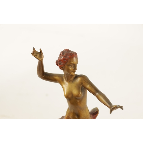 414 - A LORENZL STYLE ART DECO COLD PAINTED SPELTER FIGURE Modelled as a semi-nude dancer on rectangular o... 