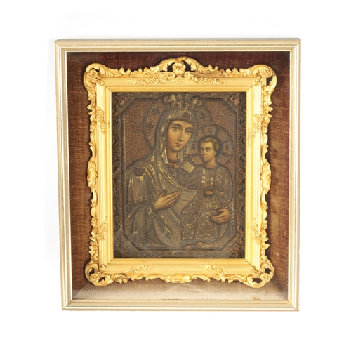 415 - A 19TH CENTURY RUSSIAN ICON depicting Virgin Mary and Christ in later glazed frame (18.5cm high, 14.... 