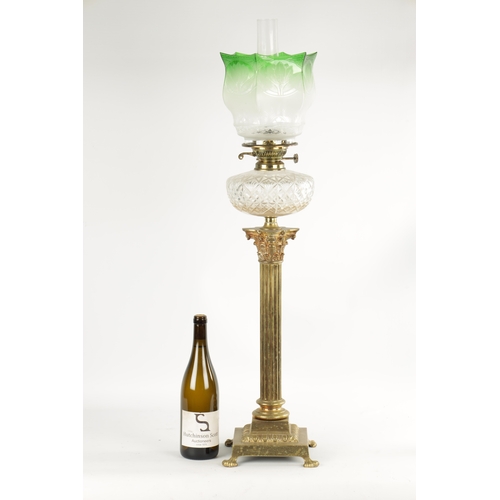 417 - A LATE 19TH CENTURY CORINTHIAN COLUMN SQUARE BASE BRASS OIL LAMP with cut clear glass reservoir, dou... 