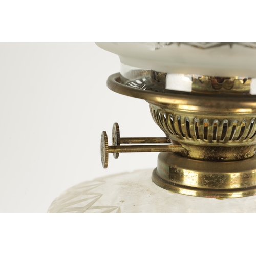 417 - A LATE 19TH CENTURY CORINTHIAN COLUMN SQUARE BASE BRASS OIL LAMP with cut clear glass reservoir, dou... 