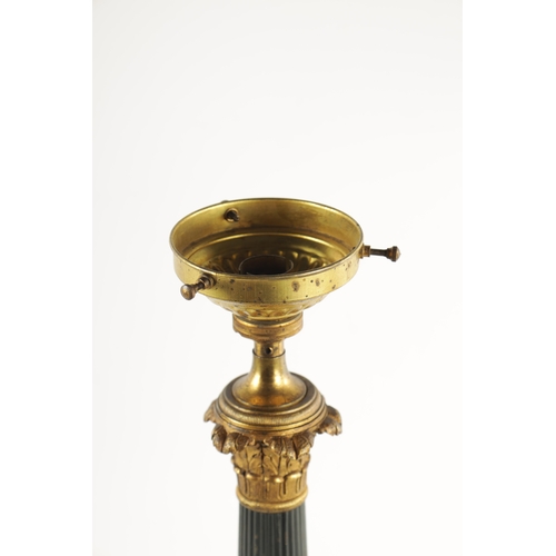 419 - A PAIR OF REGENCY STYLE BRONZE AND ORMOLU LAMP BASES with leaf cast reeded tapering stems; raised on... 