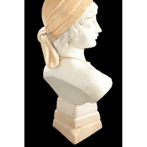 423 - AN ART DECO CARVED MARBLE BUST depicting a young lady wearing a headress and raised on a stylised an... 