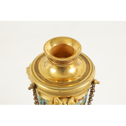 432 - A PAIR OF LATE 19TH CENTURY FRENCH ORMOLU AND CHAMPLEVE ENAMEL CASSOLETTES the domed lids reversing ... 