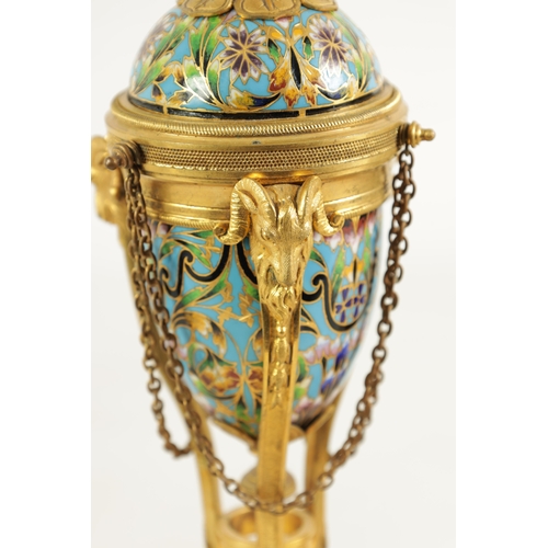 432 - A PAIR OF LATE 19TH CENTURY FRENCH ORMOLU AND CHAMPLEVE ENAMEL CASSOLETTES the domed lids reversing ... 