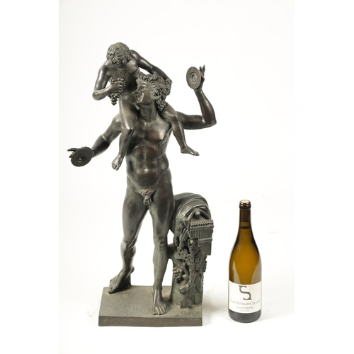 440 - A LARGE 19TH CENTURY FRENCH FIGURAL BRONZE SCULPTURE modelled as a young Pan sat on Bacchus shoulder... 