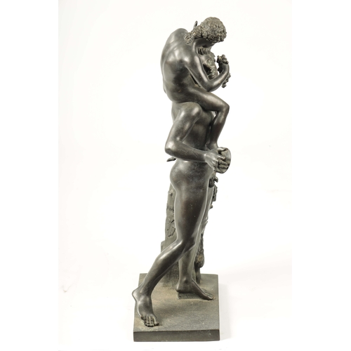 440 - A LARGE 19TH CENTURY FRENCH FIGURAL BRONZE SCULPTURE modelled as a young Pan sat on Bacchus shoulder... 