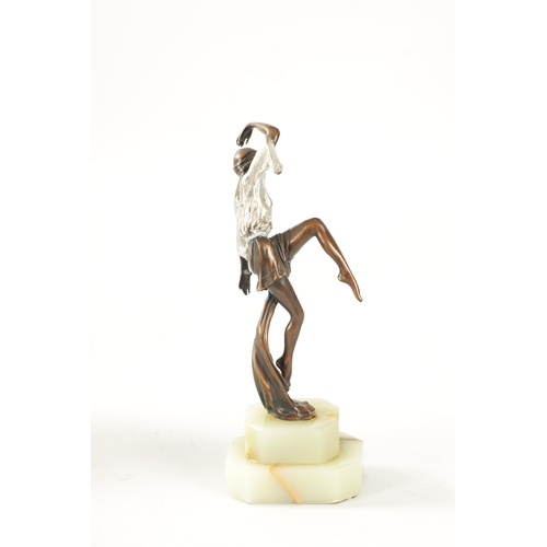 447 - ATT. JOSEF LORENZL AN ART DECO COLD PAINTED BRONZE FIGURE depicting an exotic female dancer wearing ... 