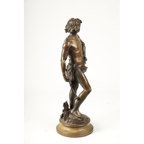 448 - ADRIENNE ETIENNE GAUDEZ. A LATE 19TH CENTURY FIGURAL BRONZE SCULPTURE OF DAVID on a moulded revolvin... 