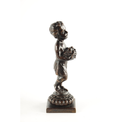 453 - A 18TH / 19TH CENTURY BRIOWN PATINATED BRONZE SCULPTURE OF A YOUNG BOY holding a fruit basket and ra... 