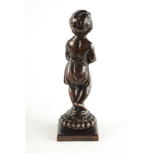 453 - A 18TH / 19TH CENTURY BRIOWN PATINATED BRONZE SCULPTURE OF A YOUNG BOY holding a fruit basket and ra... 