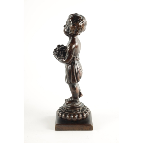 453 - A 18TH / 19TH CENTURY BRIOWN PATINATED BRONZE SCULPTURE OF A YOUNG BOY holding a fruit basket and ra... 