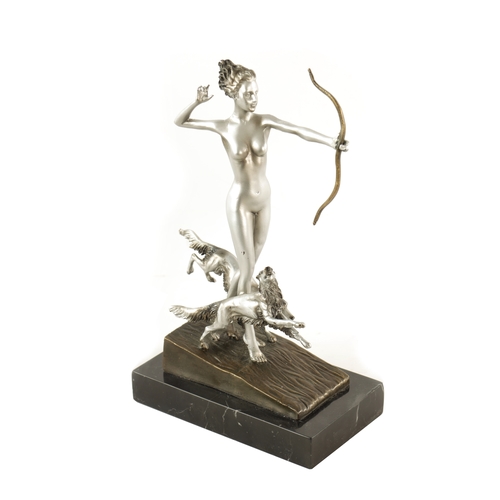 455 - AN ART DECO STYLE FIGURAL SILVERED BRONZE SCULPTURE modelled as Diana the huntress standing on a slo... 