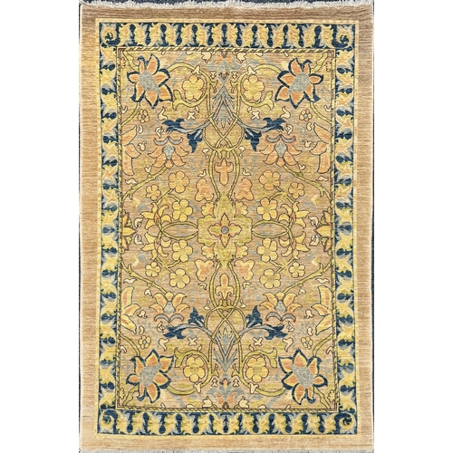 460 - A FINE CARPET OF ARTS AND CRAFTS DESIGN beige ground with overall design of bold multicoloured flowe... 