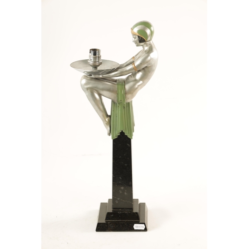 463 - AN ART DECO FIGURAL TABLE LAMP the semi-nude spelter figure with sage green and gilt clothing modell... 