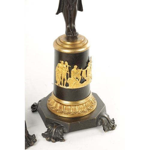 465 - A PAIR OF LATE 19TH CENTURY REGENCY STYLE BRONZE AND ORMOLU MOUNTED FIGURAL LAMP BASES with standing... 