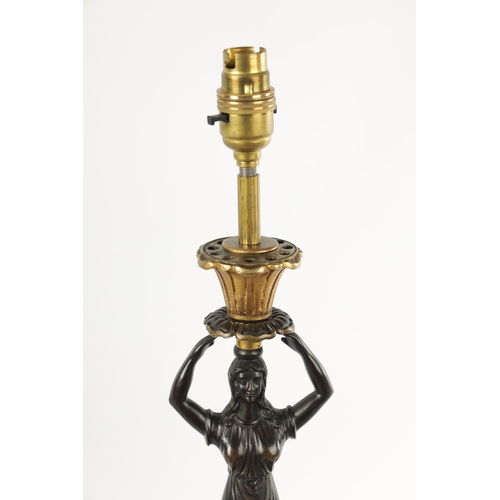 465 - A PAIR OF LATE 19TH CENTURY REGENCY STYLE BRONZE AND ORMOLU MOUNTED FIGURAL LAMP BASES with standing... 