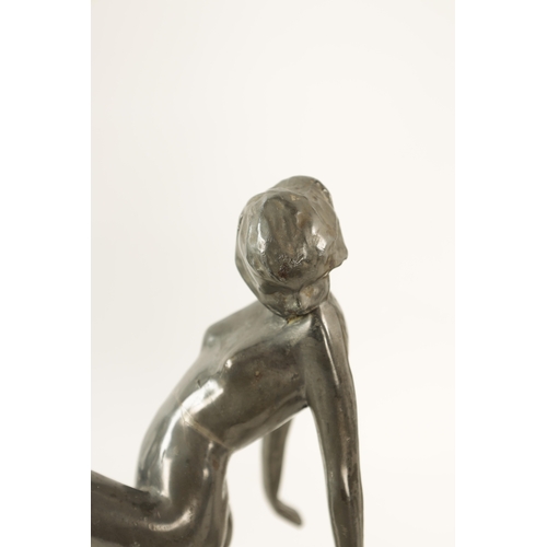 467 - A PAIR OF ART NOVEAU PEWTER FIGURAL BOOKENDS modelled as nude dancing girls standing on naturalist b... 