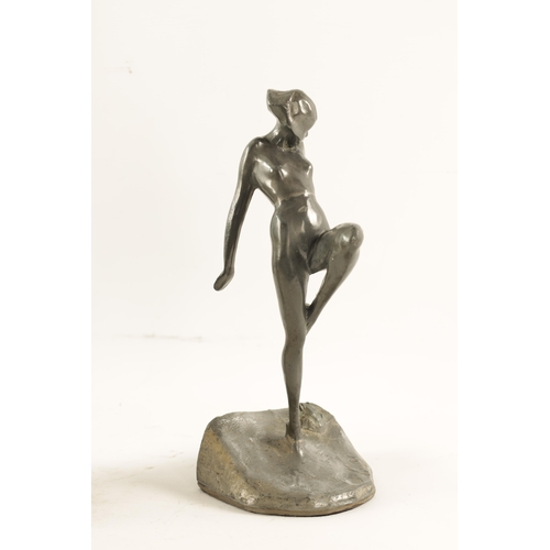 467 - A PAIR OF ART NOVEAU PEWTER FIGURAL BOOKENDS modelled as nude dancing girls standing on naturalist b... 