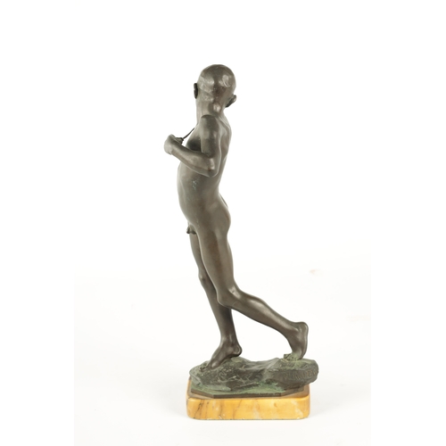 469 - SIR WILLIAM REID DICK (1879 - 1961) AN EARLY 20TH CENTURY BRONZE FIGURE “SLINGSHOT BOY” depicting a ... 