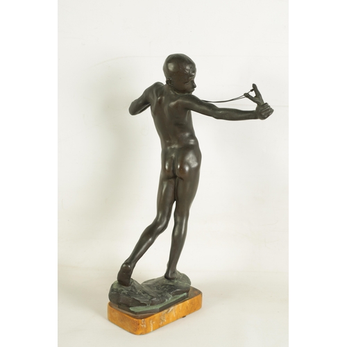 469 - SIR WILLIAM REID DICK (1879 - 1961) AN EARLY 20TH CENTURY BRONZE FIGURE “SLINGSHOT BOY” depicting a ... 